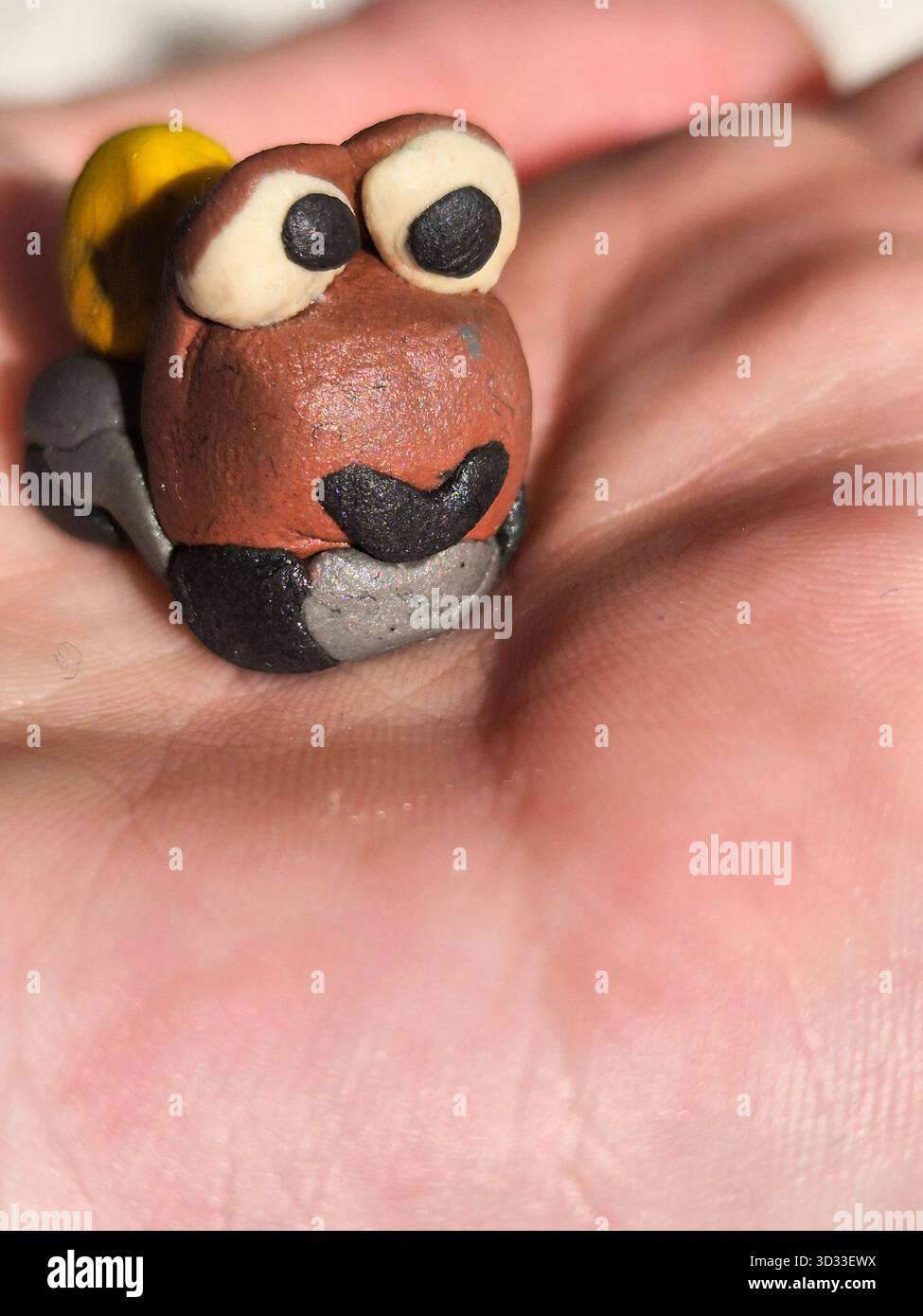 children's craft made of plasticine. plasticine figurine - Smartphone Captured Stock Image