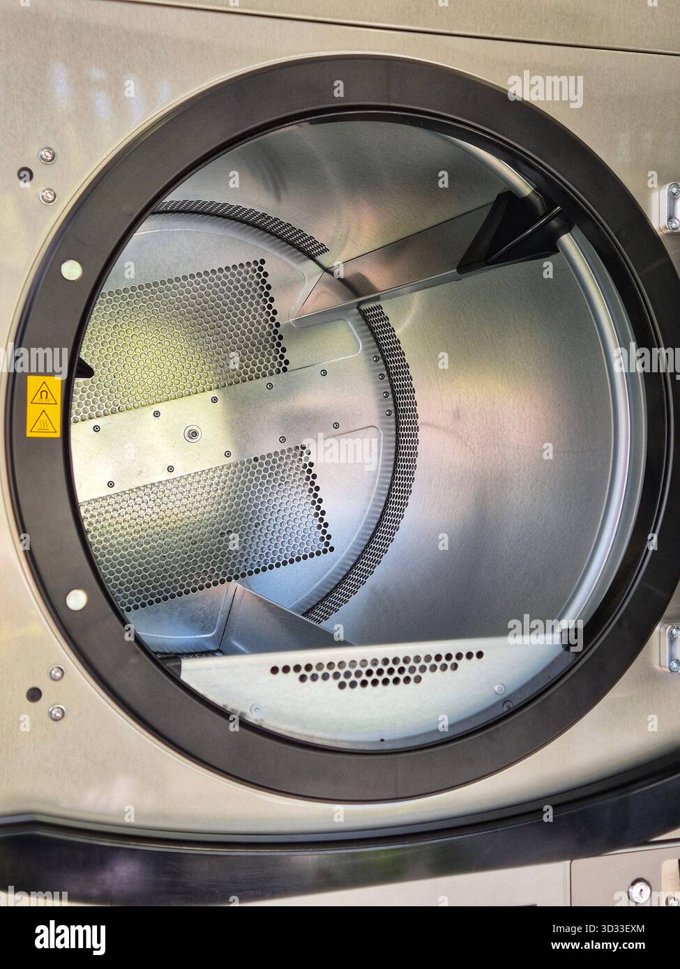 Industrial Laundry Machine Drum Coin-Operated Commercial Washer - Smartphone Captured Stock Image