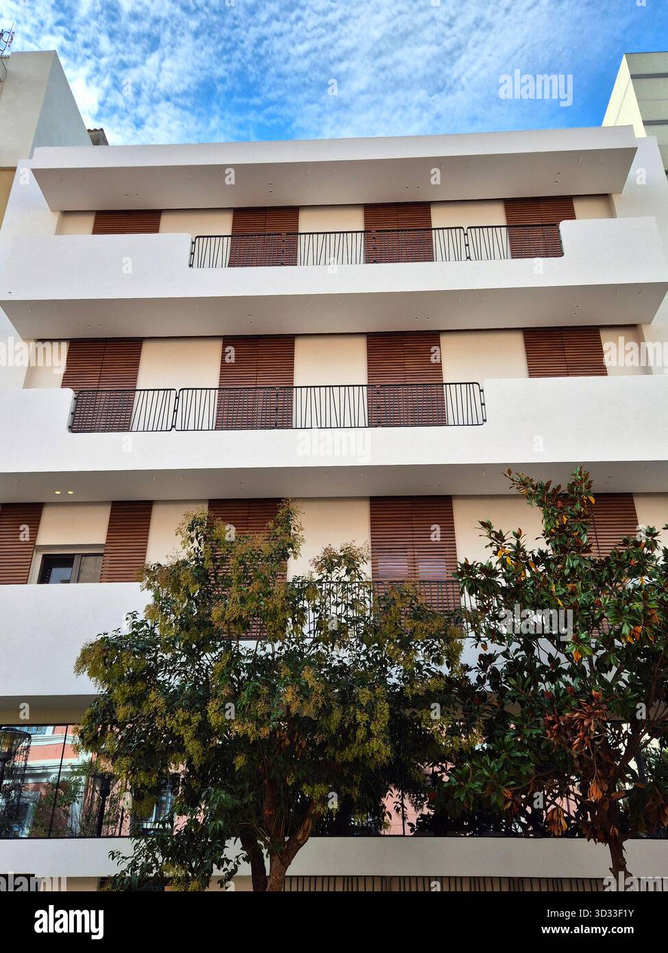 modern apartment building with balconies - Smartphone Captured Stock Image