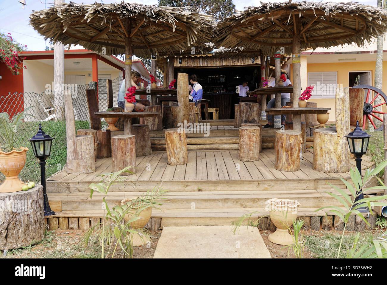 Valle de Vinales National Park, Vinales, Pinar del Rio Province, Cuba, Greater Antilles, Caribbean, Central America, rustic wooden terrace with seats Stock Photo