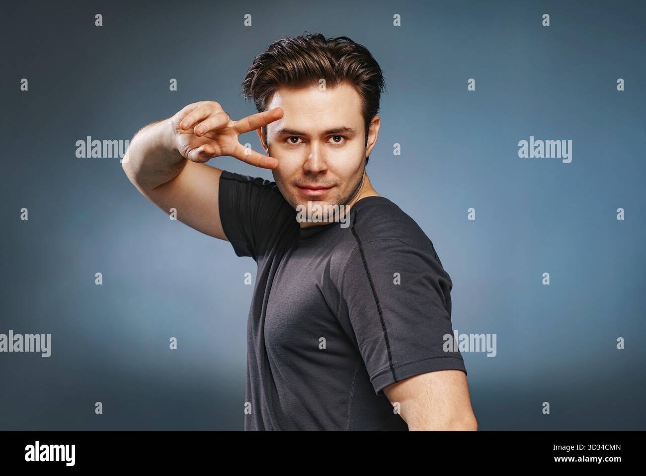 Young brunette handsome man posing Stock Photo