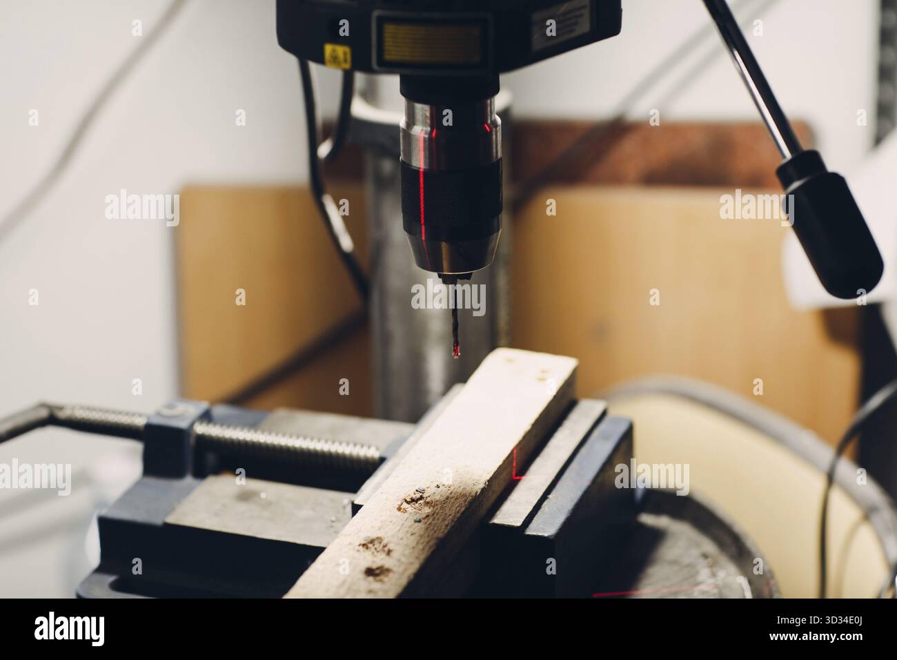 Drilling machine with laser sight in the workshop Stock Photo