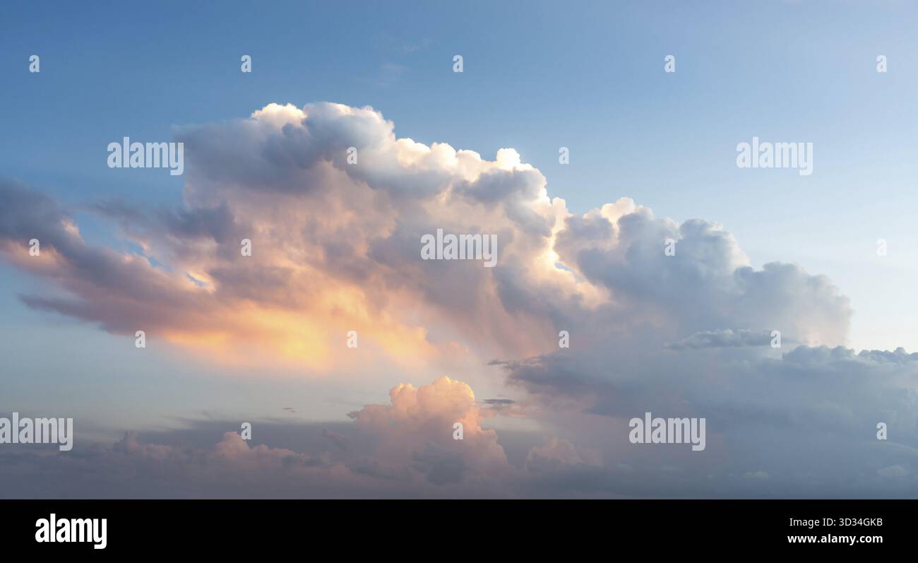 Blue sunset sky with many nice white clouds Stock Photo