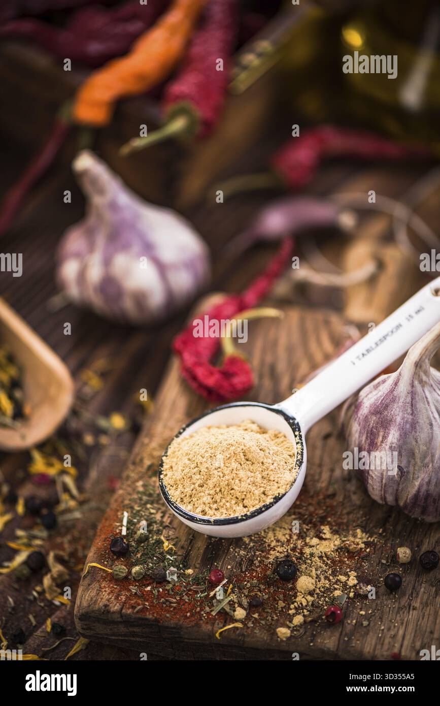 Dried ginger powder on spoon Stock Photo