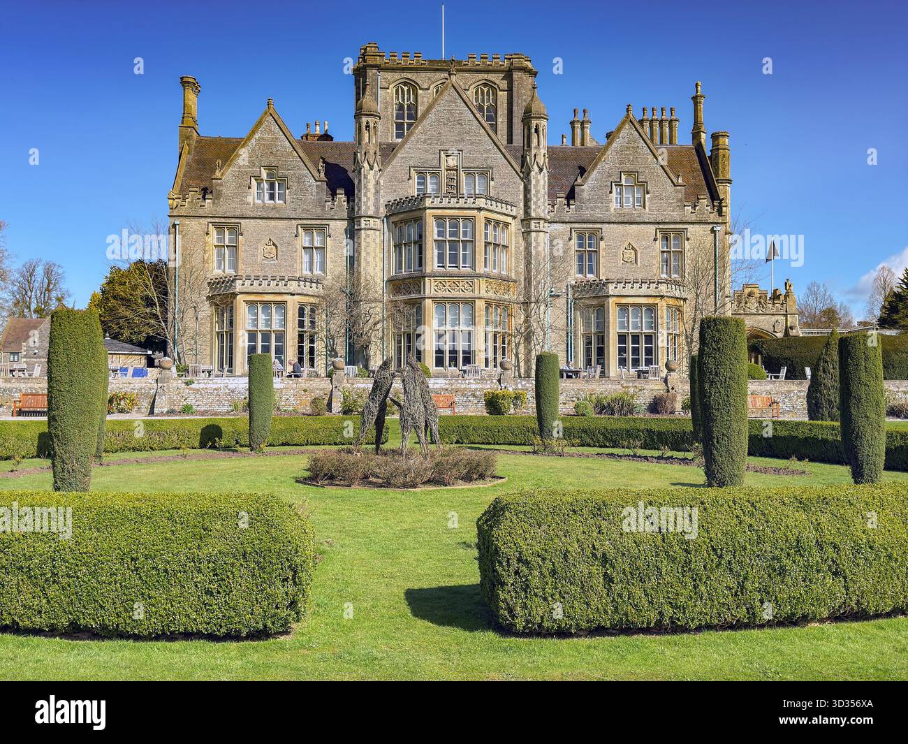 Gloucester, Gloucestershire, England, UK - 28 March 2025: Scenic view of the main building and landscaped gardens of the Tortworth Court Hotel - Smartphone Captured Stock Image
