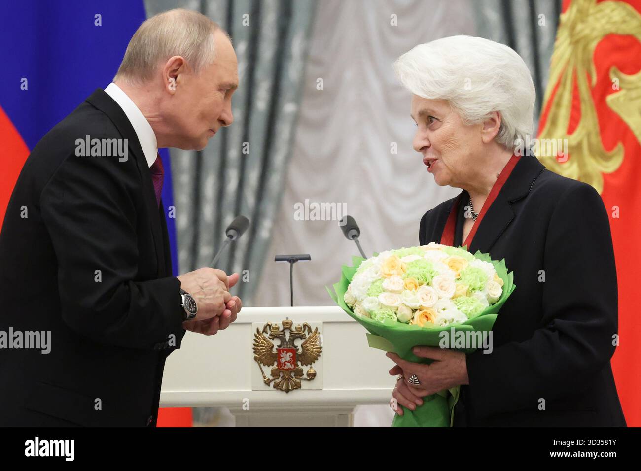 russian-president-vladimir-putin-left-awards-the-head-of-the