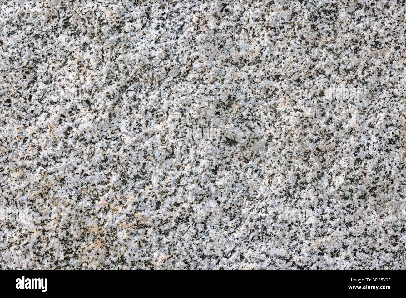 Rough textured white granite stone texture Stock Photo