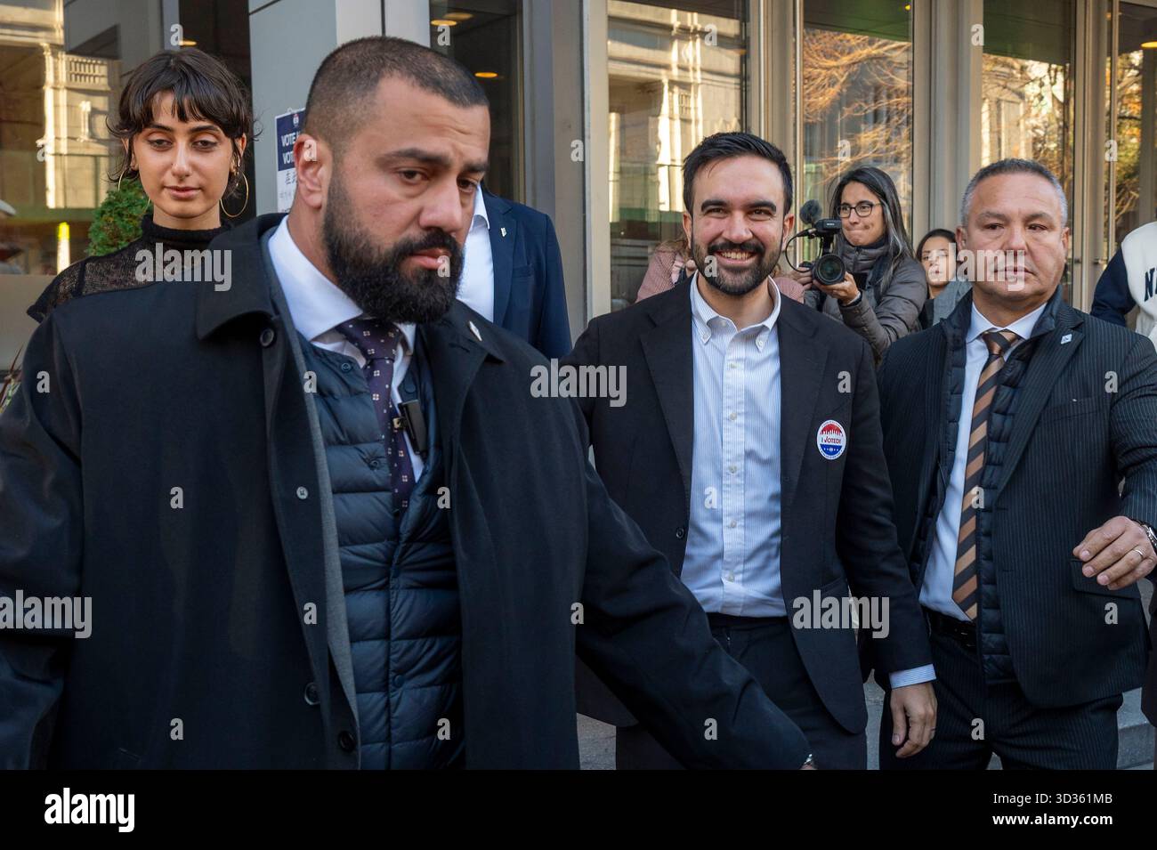 New York, United States. 04th Nov, 2025. Democratic New York City mayoral candidate Zohran Mamdani and his wife Rama Duwaji exist polling site after casting their vote in the general election at Frank Sinatra High School in New York City. Credit: SOPA Images Limited/Alamy Live News Stock Photo