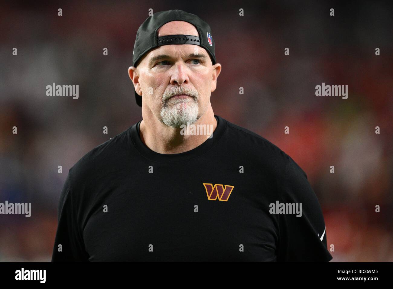 Washington Commanders head coach Dan Quinn looks on before an NFL ...