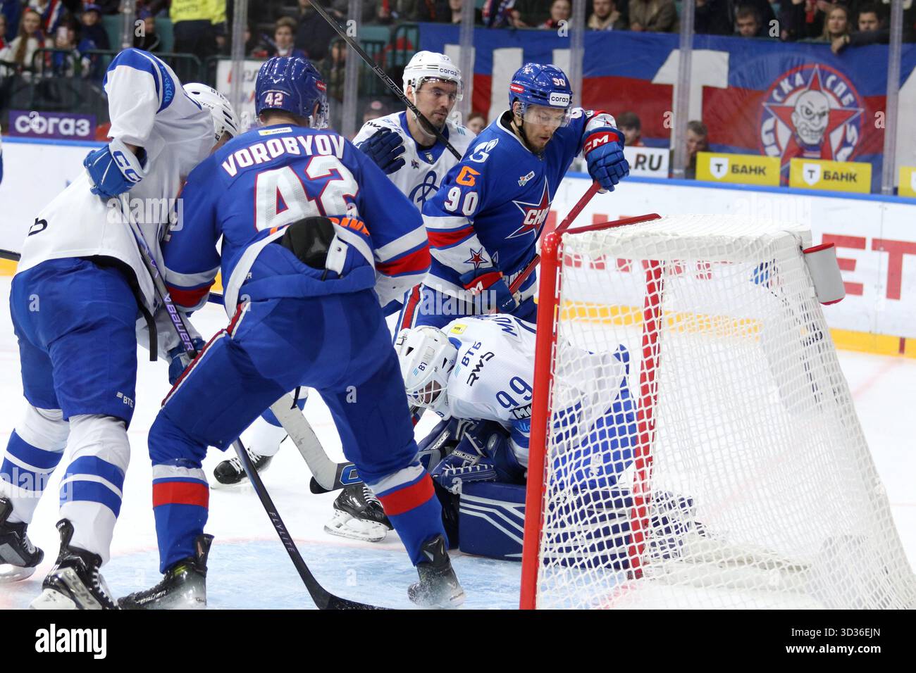 Saint Petersburg, Russia. 04th Nov, 2025. Maxim Motorygin (99), Igor Ozhiganov (92) of Dynamo and Valentin Zykov (90) and Mikhail Vorobyov (42) of SKA Hockey Club seen in action during the Hockey match, Kontinental Hockey League 2025/2026 between SKA Saint Petersburg and Dynamo Moscow at the Ice Sports Palace. (Final score; SKA Saint Petersburg 1:2 Dynamo Moscow). Credit: SOPA Images Limited/Alamy Live News Stock Photo