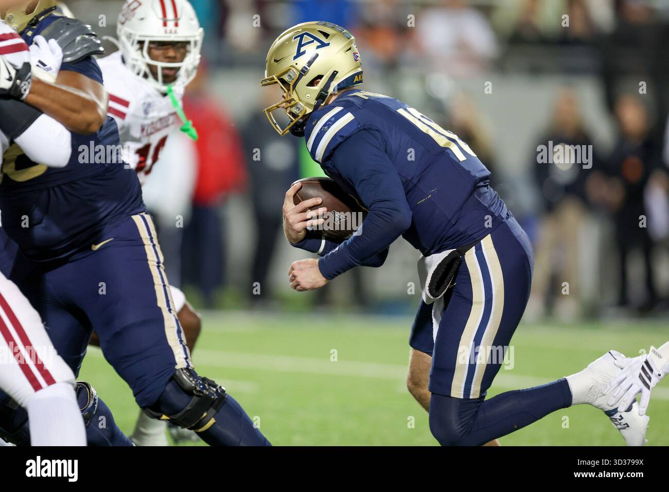 AKRON, OH - NOVEMBER 04: Akron Zips quarterback Ben Finley (10) carries ...