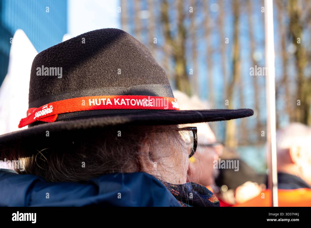 Katowice, Poland. 04th Nov, 2025. A woman wears a hat with Katowice Steelworks name during a protest in front of Silesia voivodeship government office. Labour unions, primarily Solidarity movement, of mining and steel industries called for protest as negotiations with the Polish government on the issue of energy transformation did not bring satisfactory results. This week, the Polish government adopted a draft law which will protect miners leaving the industry, but the union say the law is not enough. Credit: SOPA Images Limited/Alamy Live News Stock Photo