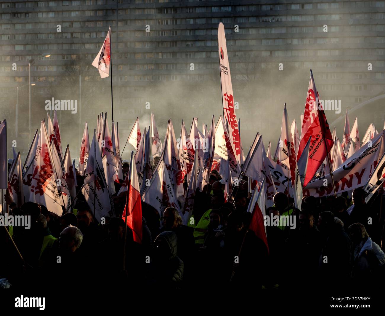 Katowice, Poland. 04th Nov, 2025. Coal miners and steelworks workers hold banners with names of their labour unions during a protest in front of Silesia voivodeship government office. Labour unions, primarily Solidarity movement, of mining and steel industries called for protest as negotiations with the Polish government on the issue of energy transformation did not bring satisfactory results. This week, the Polish government adopted a draft law which will protect miners leaving the industry, but the union say the law is not enough. Credit: SOPA Images Limited/Alamy Live News Stock Photo