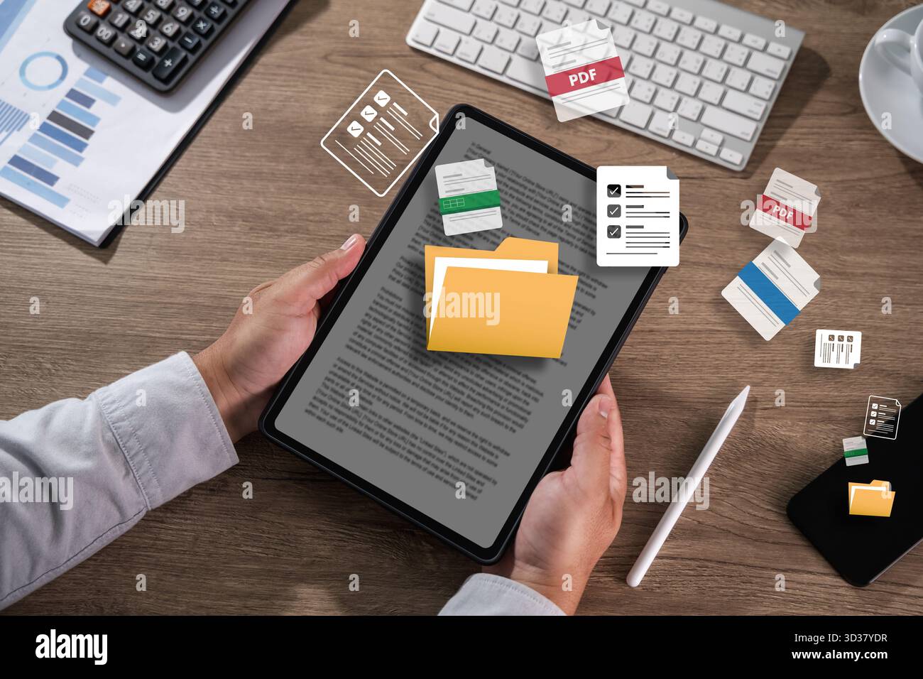 man manage digital documents spreadsheet Data Information file copies and optimize workflow Backup online document files Stock Photo