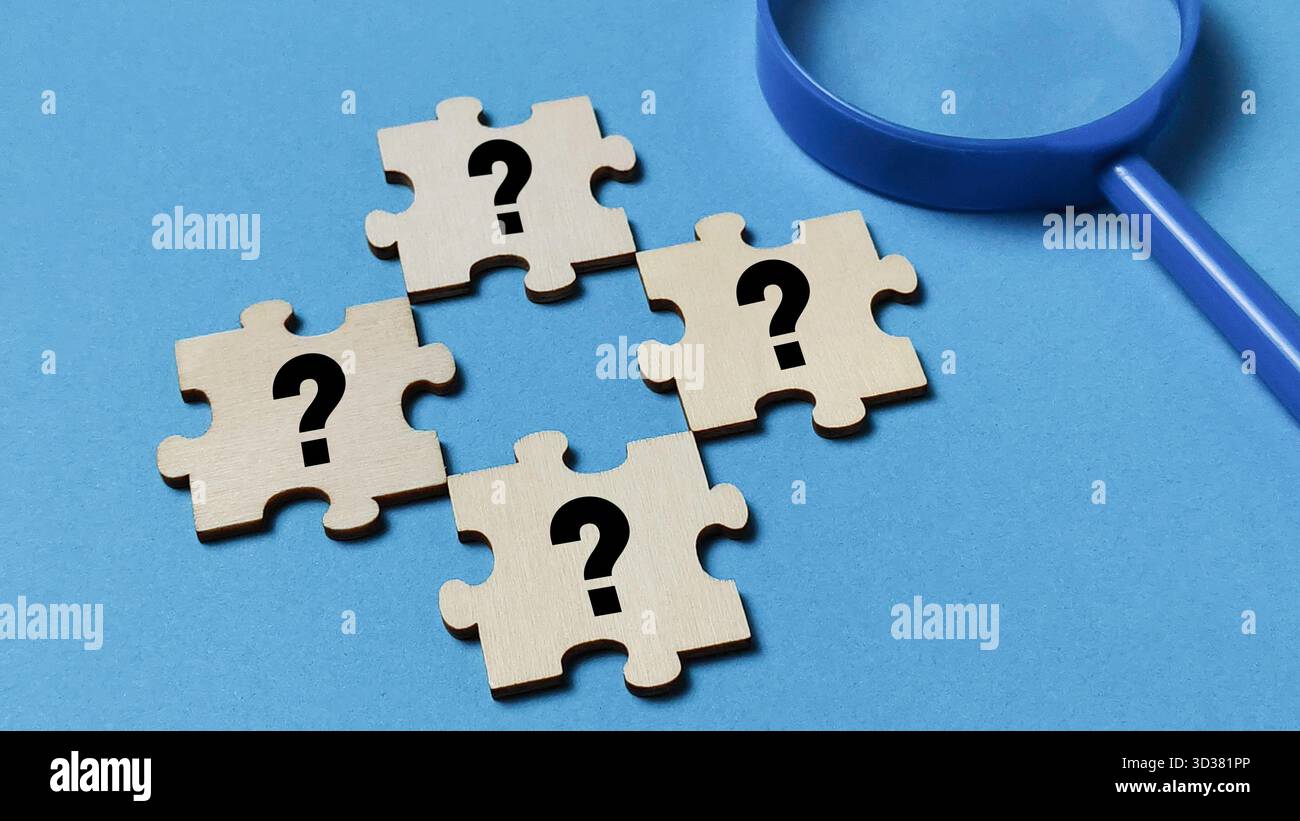 Searching for Answers and Solving Problems Concept with Puzzle Pieces Stock Photo