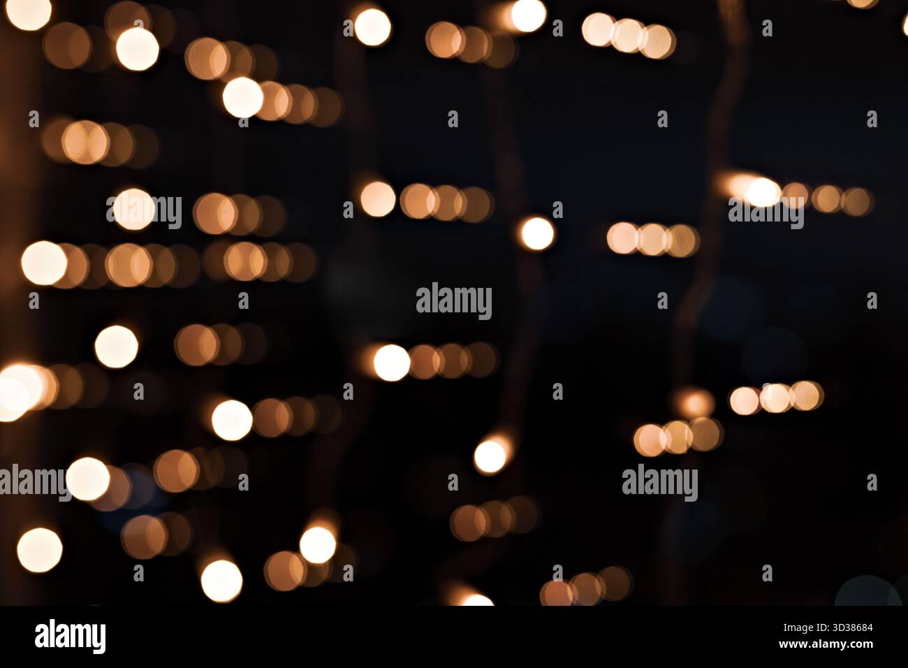 Defocused Warm Lights in Symmetrical Bokeh Pattern Stock Photo