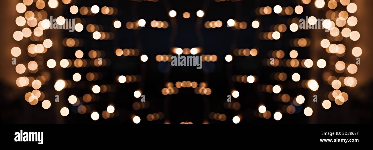 Defocused Warm Lights in Symmetrical Bokeh Pattern Stock Photo
