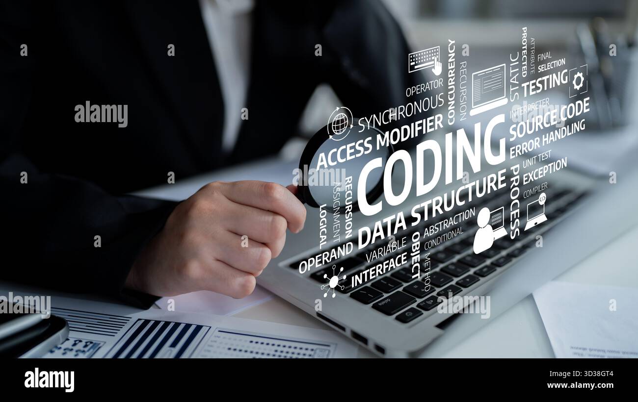 A professional software developer focuses on coding tasks using a laptop, showcasing various programming concepts and terms related to technology and Stock Photo