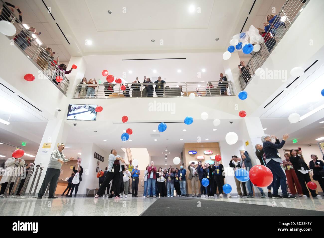 San Diego, California, USA. 04th Nov, 2025. Staff members of San Diego County celebrate after finishing the voting process of the election by dropping balloons at San Diego County Operations Center. On Tuesday, November 4, 2025, Californians headed to the polls for a special statewide election, with one major issue on the ballot, Proposition 50. The measure proposed a constitutional change that would let the state Legislature redraw U.S. House districts mid-decade, rather than leaving that task to the independent commission. Credit: SOPA Images Limited/Alamy Live News Stock Photo