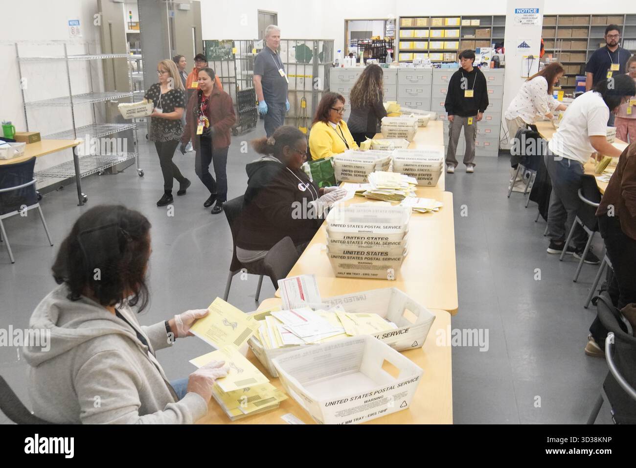 San Diego, California, USA. 04th Nov, 2025. Staff members of San Diego County process the ballots after the election at San Diego County Operations Center. On Tuesday, November 4, 2025, Californians headed to the polls for a special statewide election, with one major issue on the ballot, Proposition 50. The measure proposed a constitutional change that would let the state Legislature redraw U.S. House districts mid-decade, rather than leaving that task to the independent commission. Credit: SOPA Images Limited/Alamy Live News Stock Photo