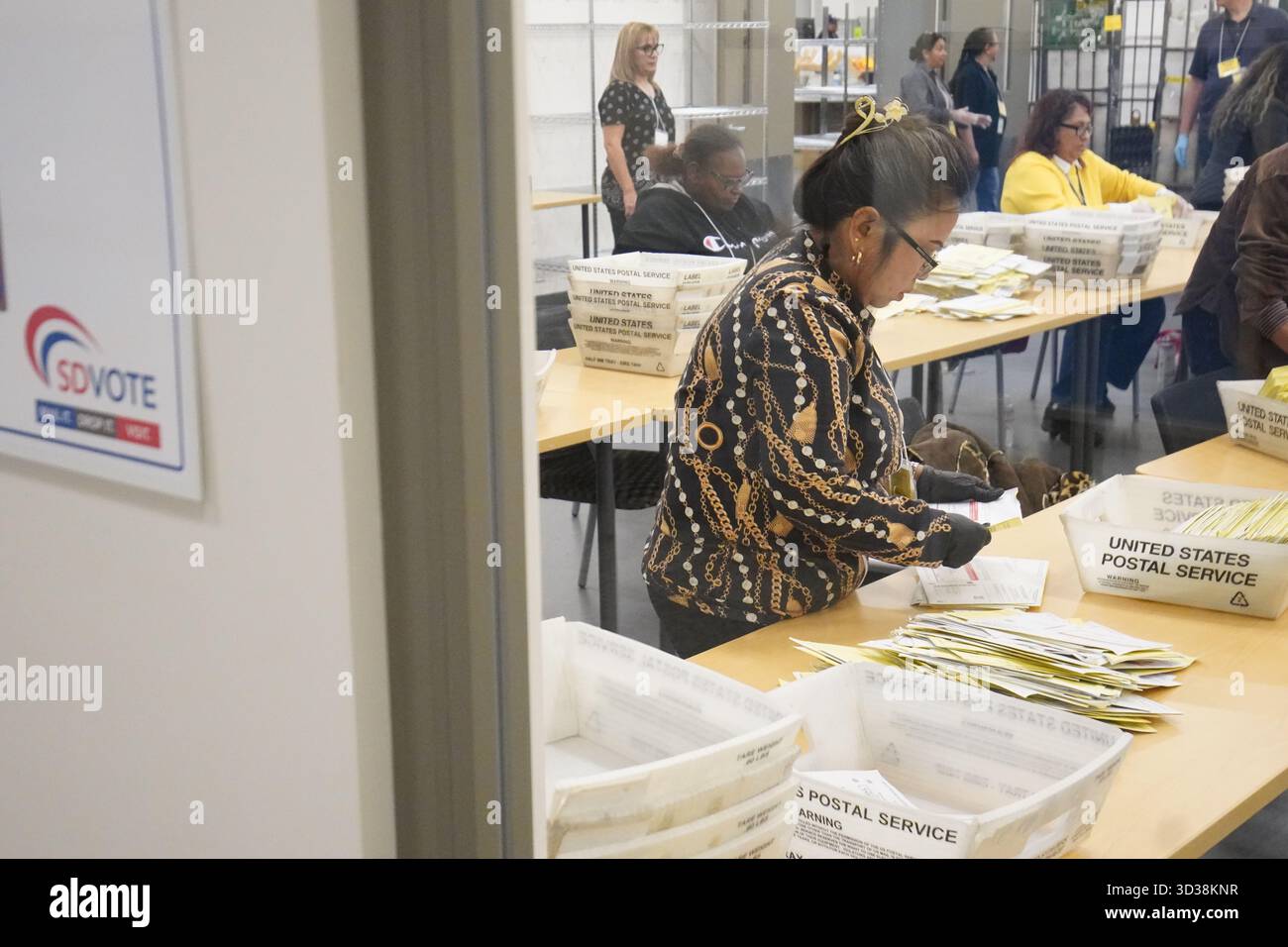 San Diego, California, USA. 04th Nov, 2025. Staff members of San Diego County process the ballots after the election at San Diego County Operations Center. On Tuesday, November 4, 2025, Californians headed to the polls for a special statewide election, with one major issue on the ballot, Proposition 50. The measure proposed a constitutional change that would let the state Legislature redraw U.S. House districts mid-decade, rather than leaving that task to the independent commission. Credit: SOPA Images Limited/Alamy Live News Stock Photo