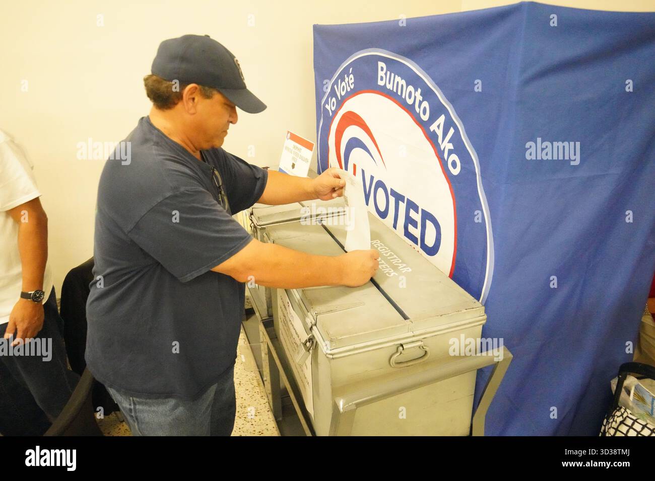 A man casts his vote during the election day at San Diego County ...