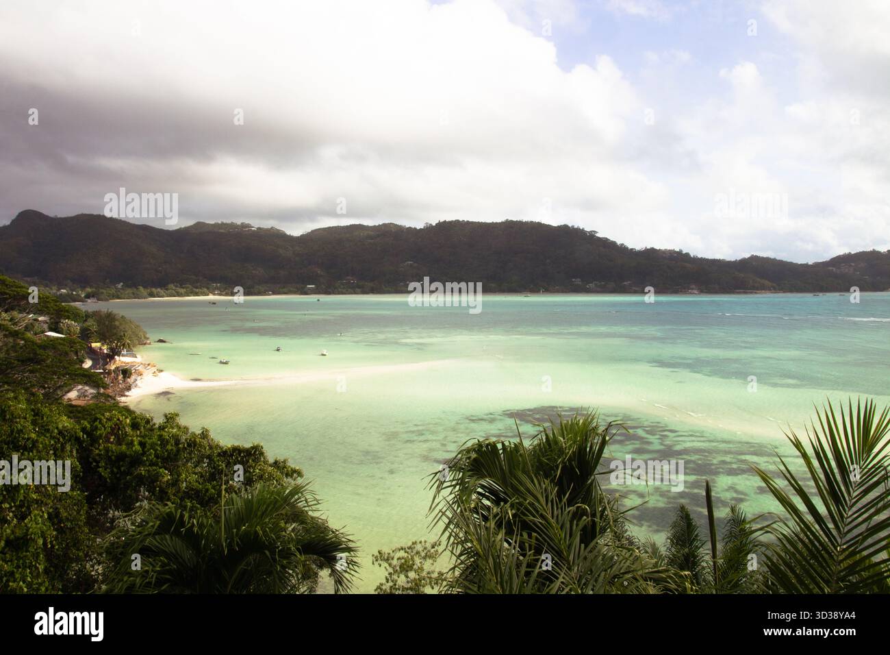 Shallow turquoise waters at Anse Boileau, Mahé, Seychelles Stock Photo