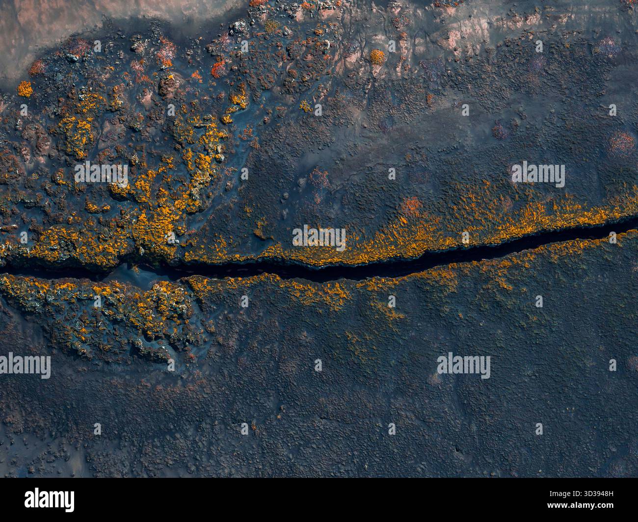 Aerial view of Icelandic lava field rift with bright moss edges Stock ...
