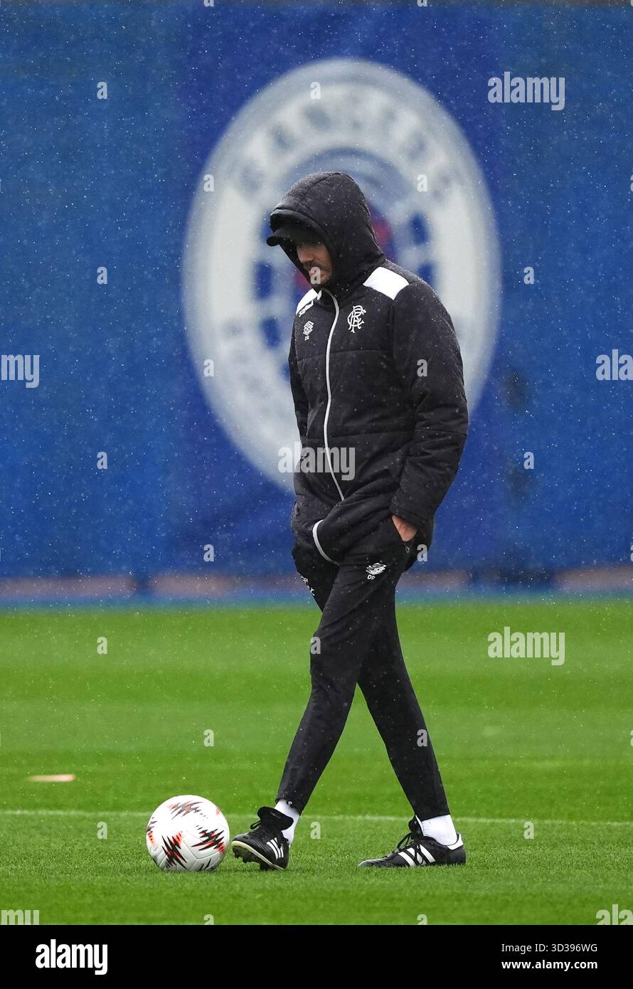 Danny Rohl Rangers Fc Training Rangers manager Danny Rohl with the club badge in the background during ...