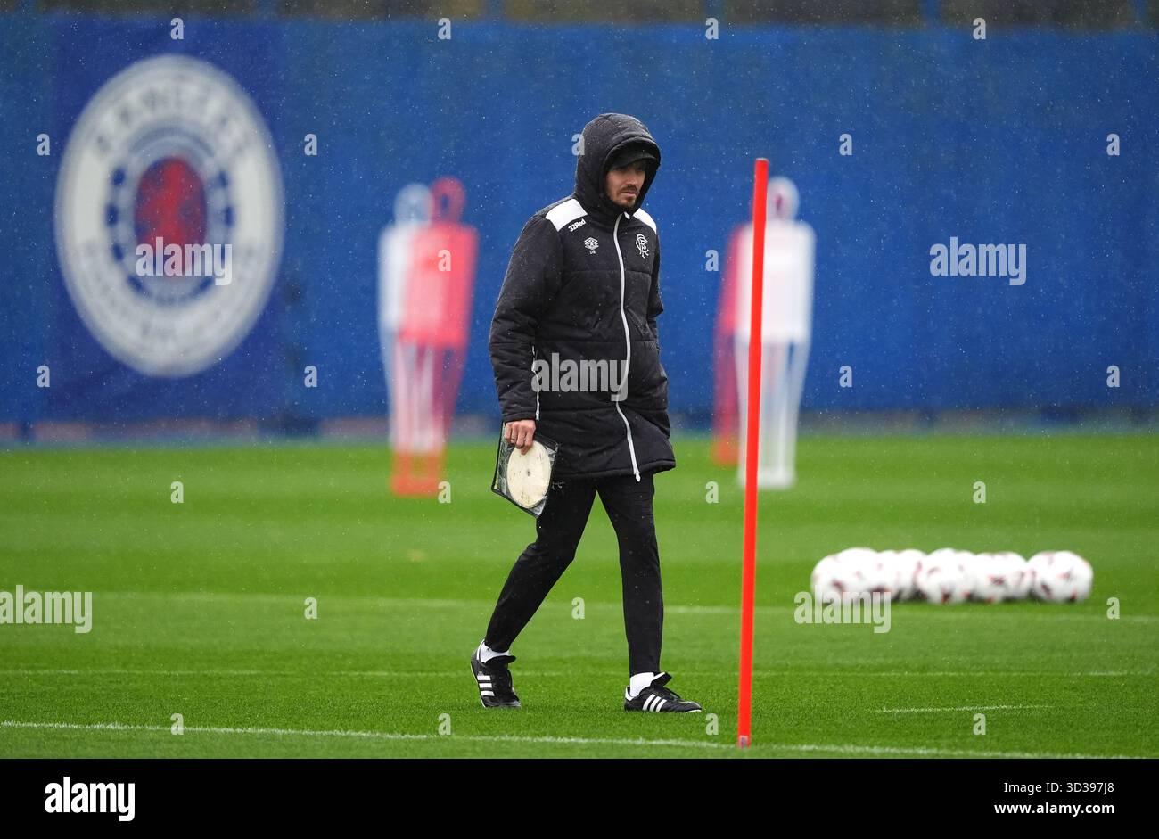 Danny Rohl Rangers Fc Training Rangers manager Danny Rohl with the club badge in the background during ...