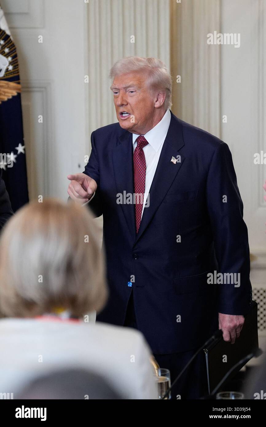 US President Donald Trump delivers remarks at the breakfast with ...