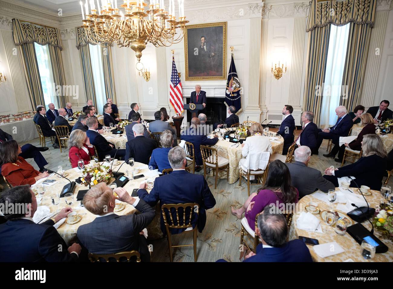 US President Donald Trump delivers remarks at the breakfast with ...