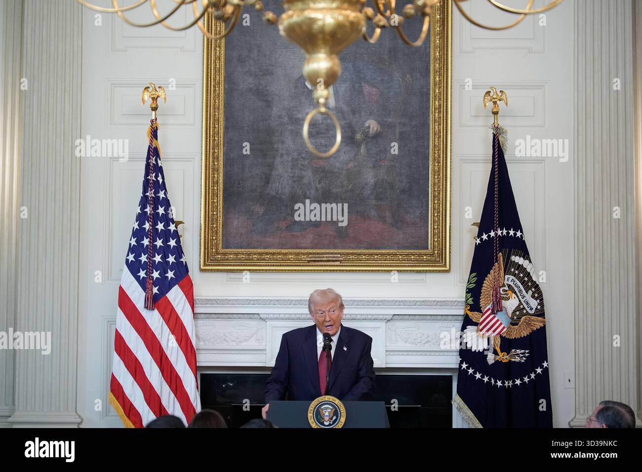 US President Donald Trump delivers remarks at the breakfast with ...