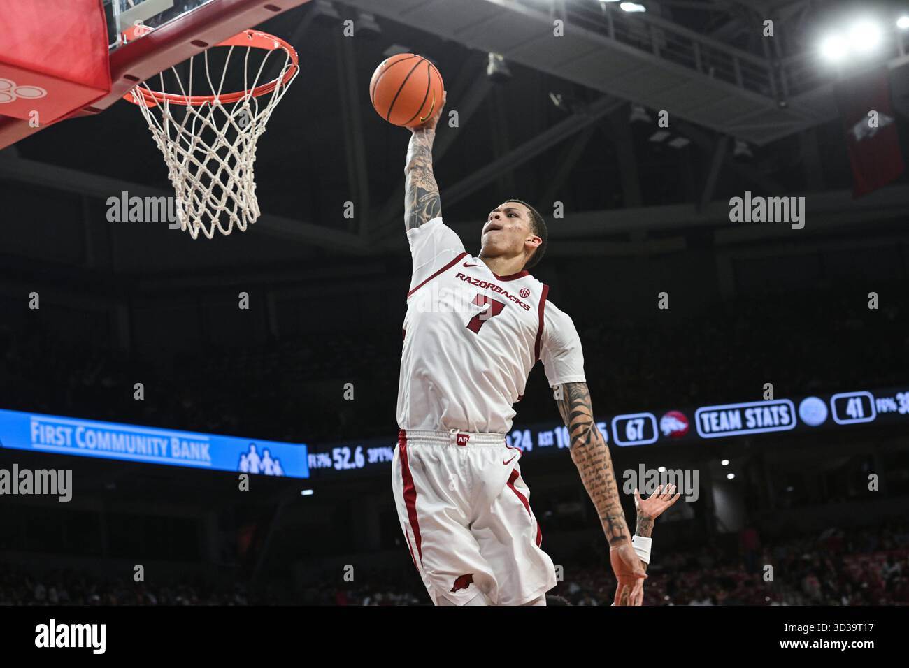 Arkansas forward Trevon Brazile (7) dunks the ball on a fast break ...