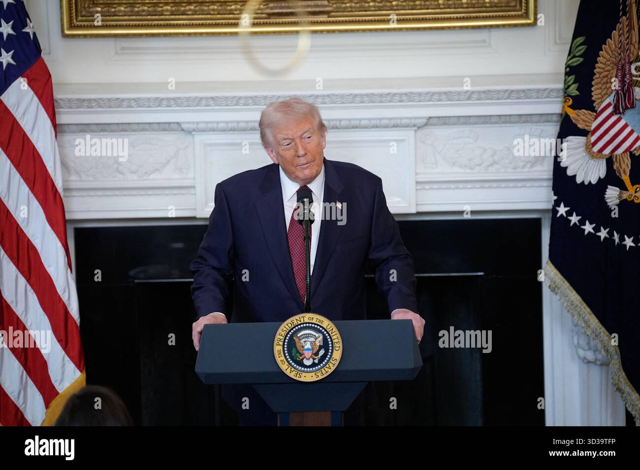 US President Donald Trump delivers remarks at the breakfast with ...