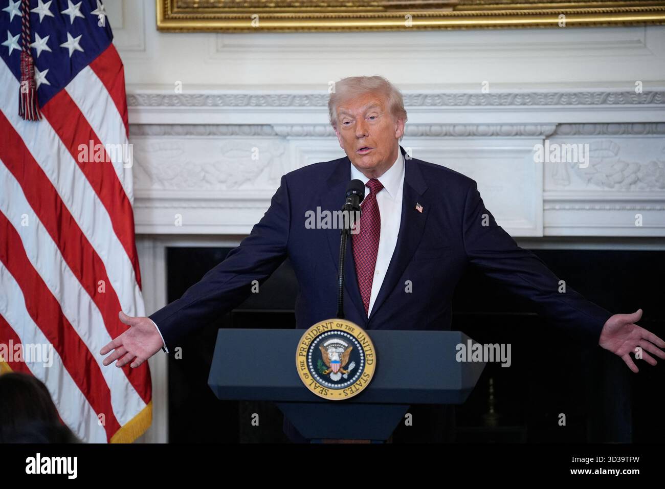 US President Donald Trump delivers remarks at the breakfast with ...