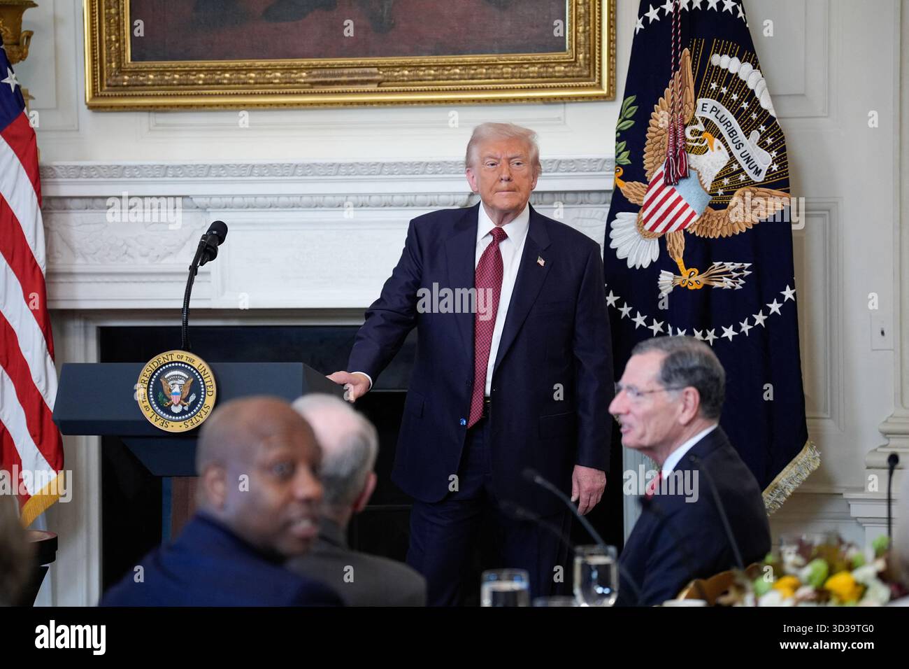 US President Donald Trump delivers remarks at the breakfast with ...