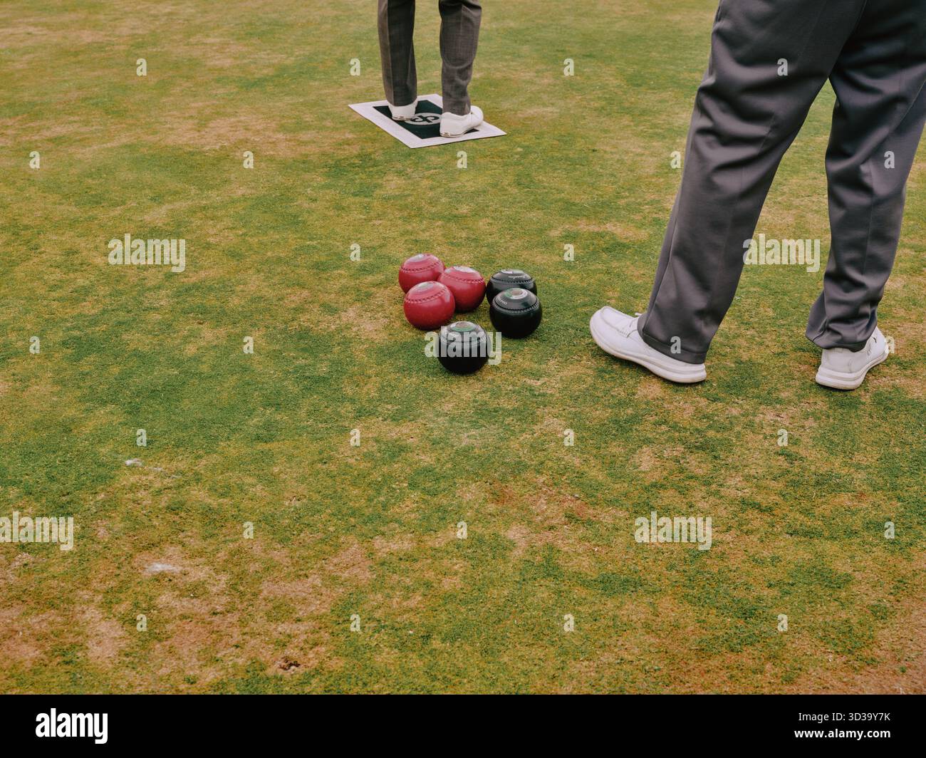 Crown Green Bowling  - bowling green with legs and balls Stock Photo