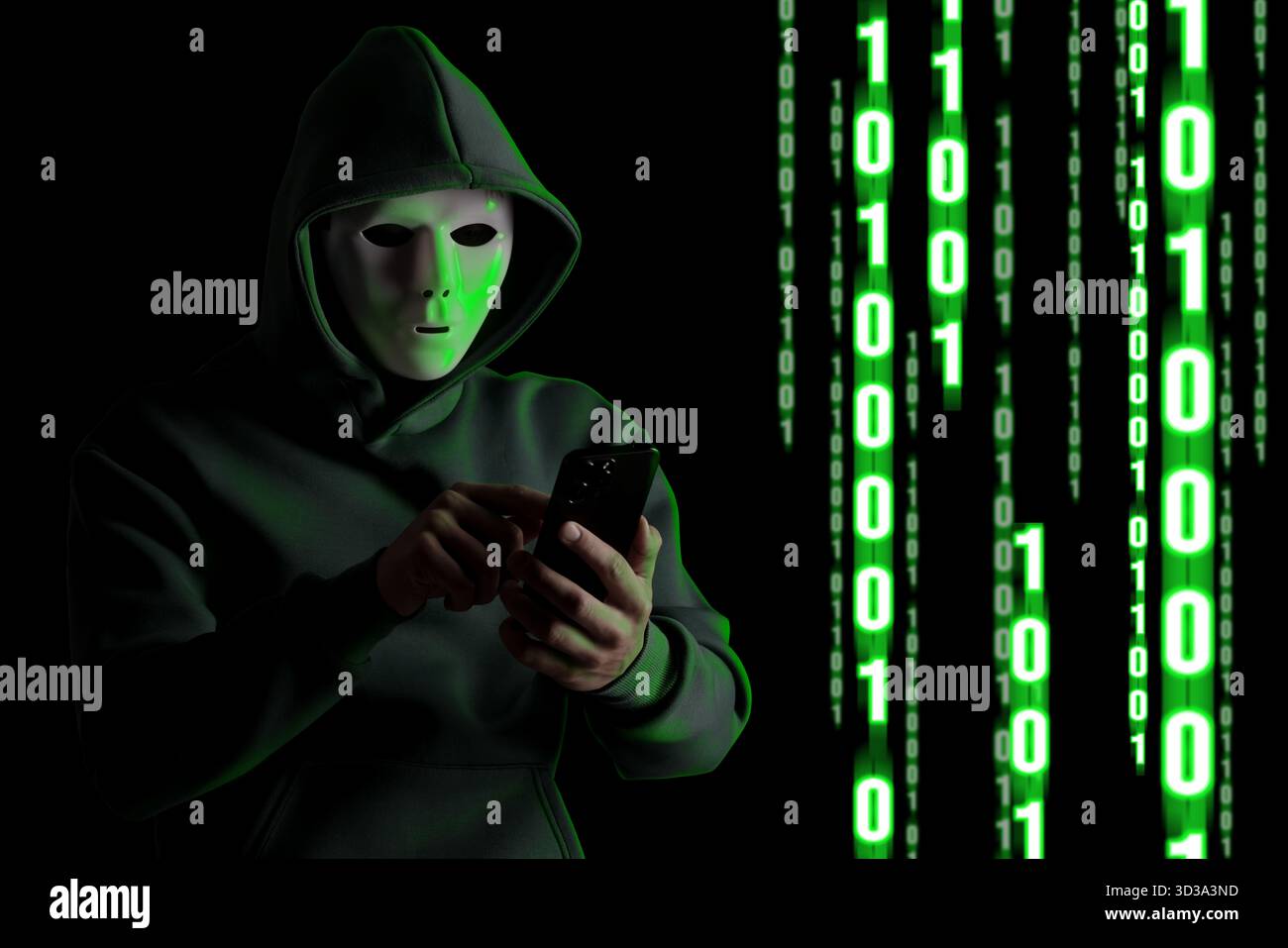 Cyber attack. Hacker in mask using mobile phone on black background. Green glowing binary code near him Stock Photo