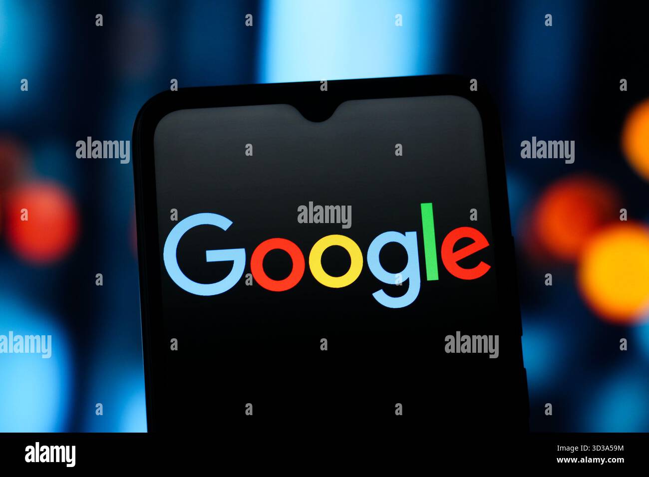 In this photo illustration, the Google logo is seen displayed on a smartphone screen. Stock Photo