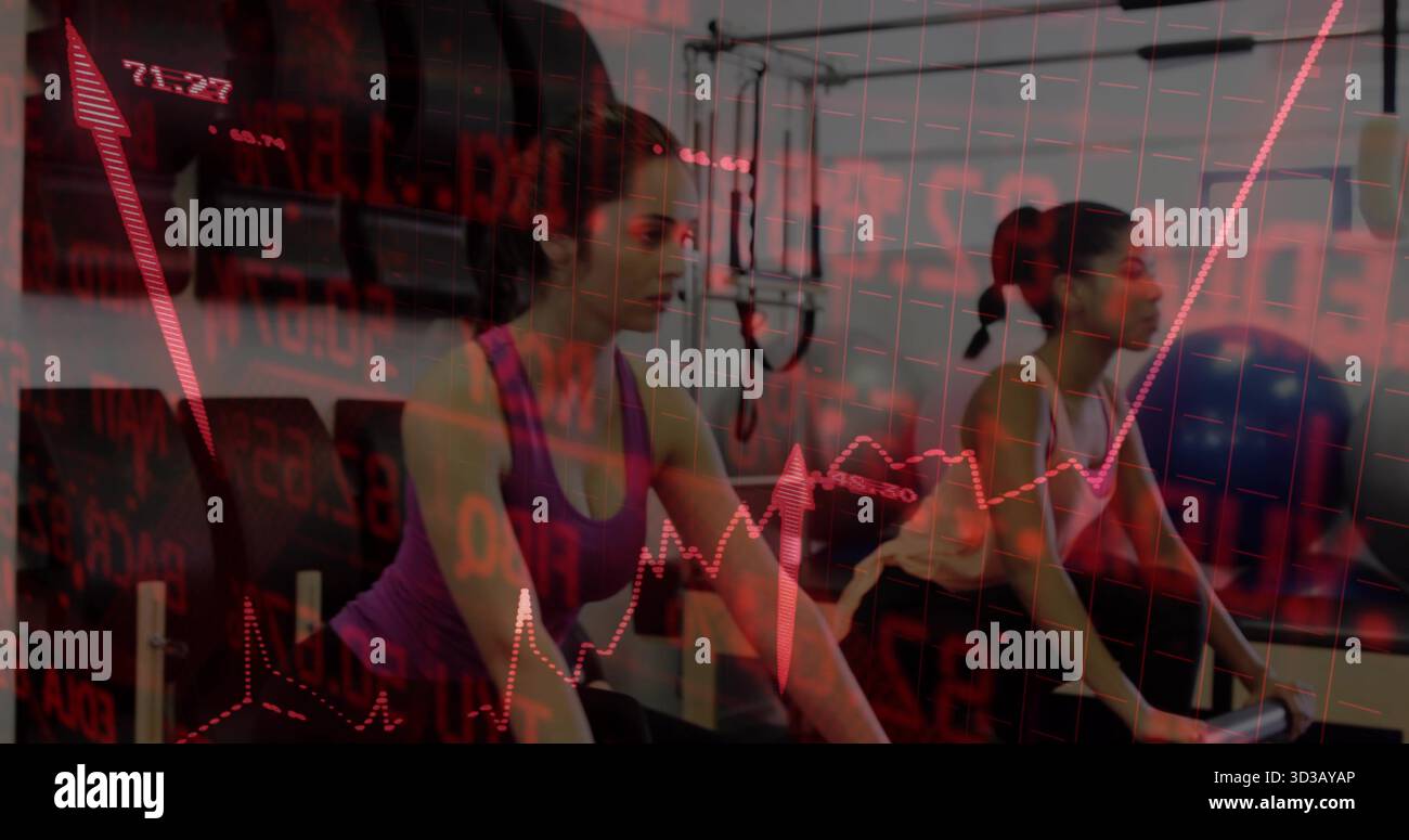 Pindiling Exercise Pedaling friends wearing workout gear riding exercise bikes in gym with ...