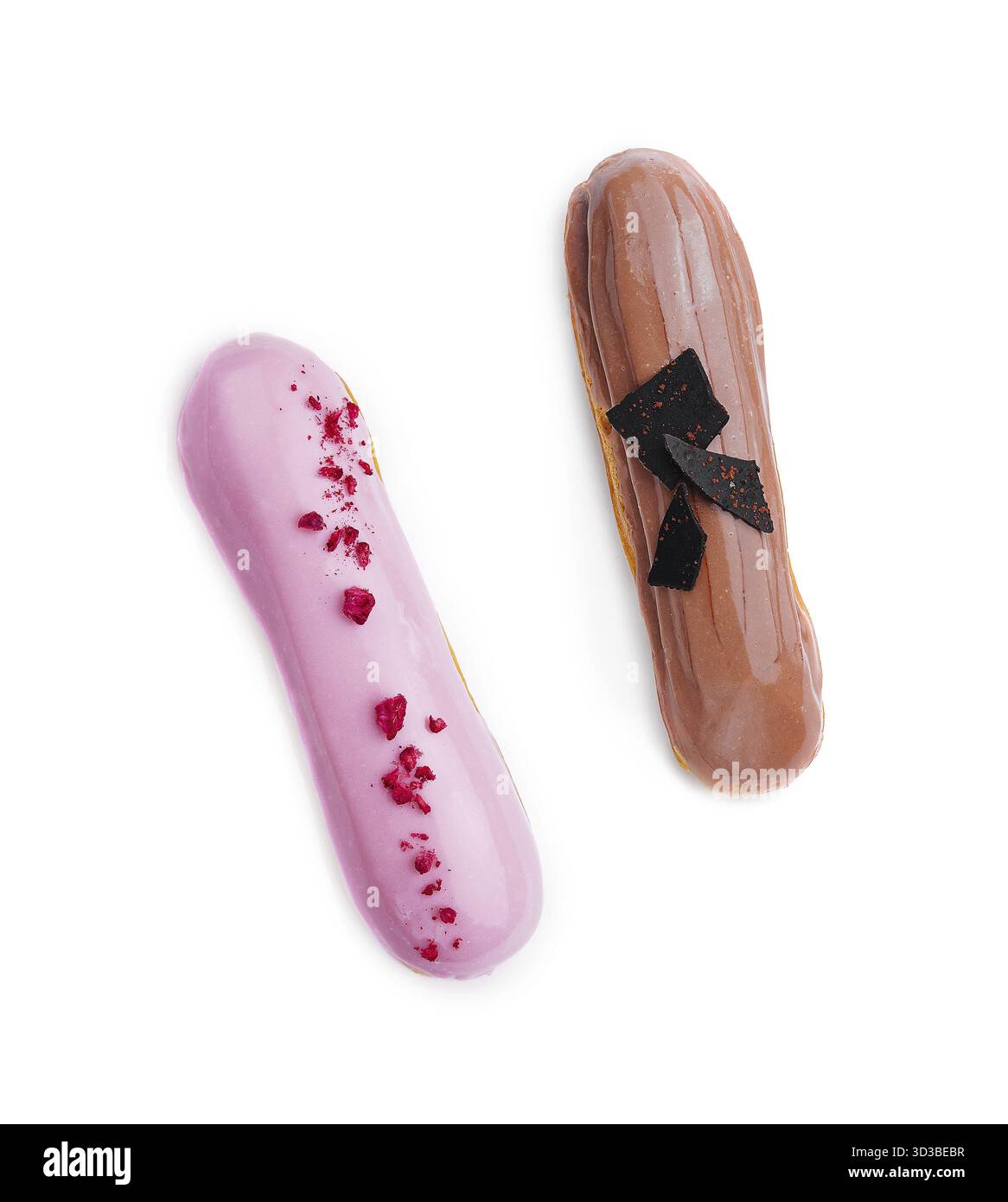 Food, Chocolate and raspberry eclairs isolated on white background Stock Photo