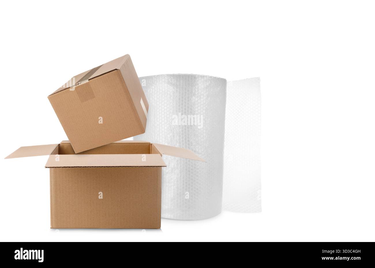 Cardboard boxes and bubble wrap roll on white background Stock Photo