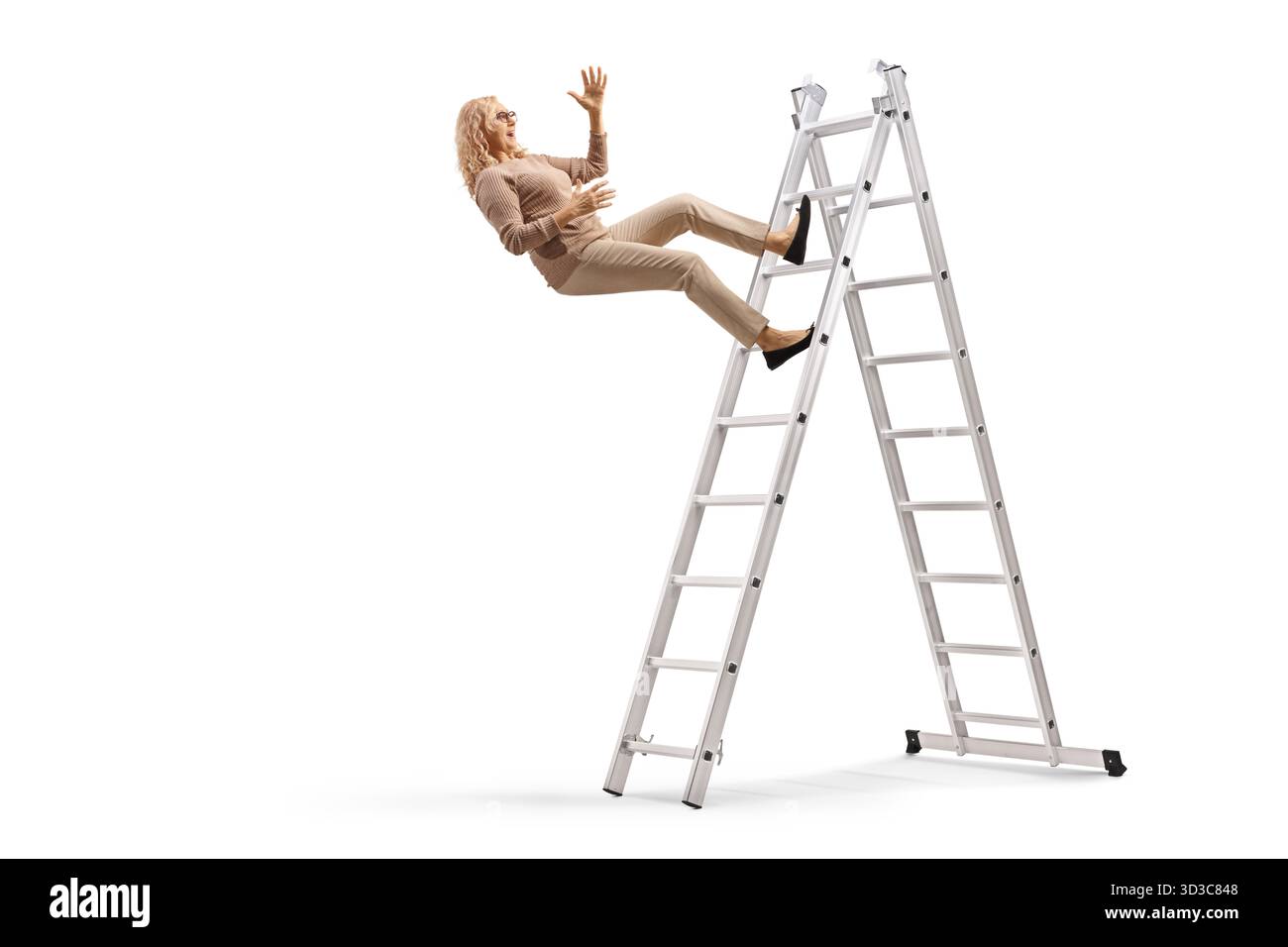 Full length profile shot of a woman falling off a ladder isolated on ...