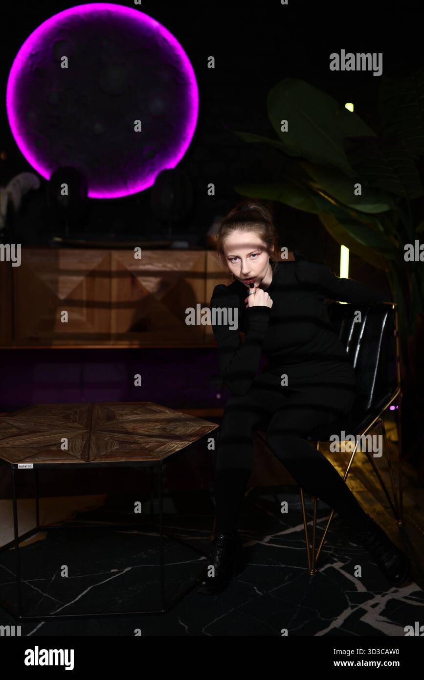 woman in studio, contemplative woman with creative ambiance, night ...