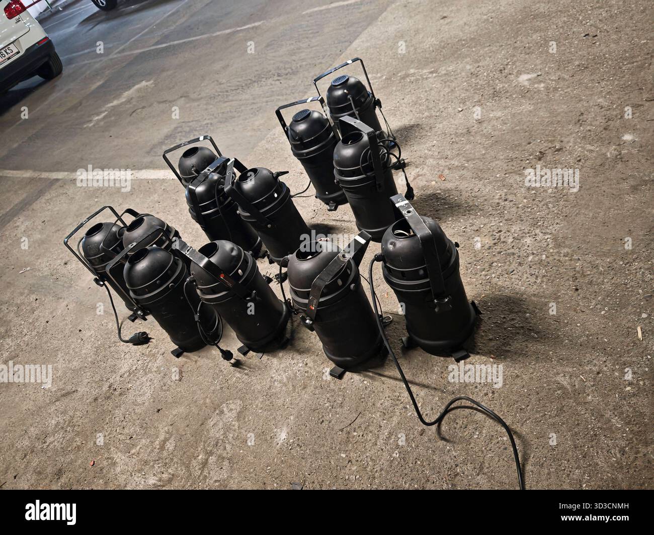 event technician preparing the stage, sound and light for an event ...