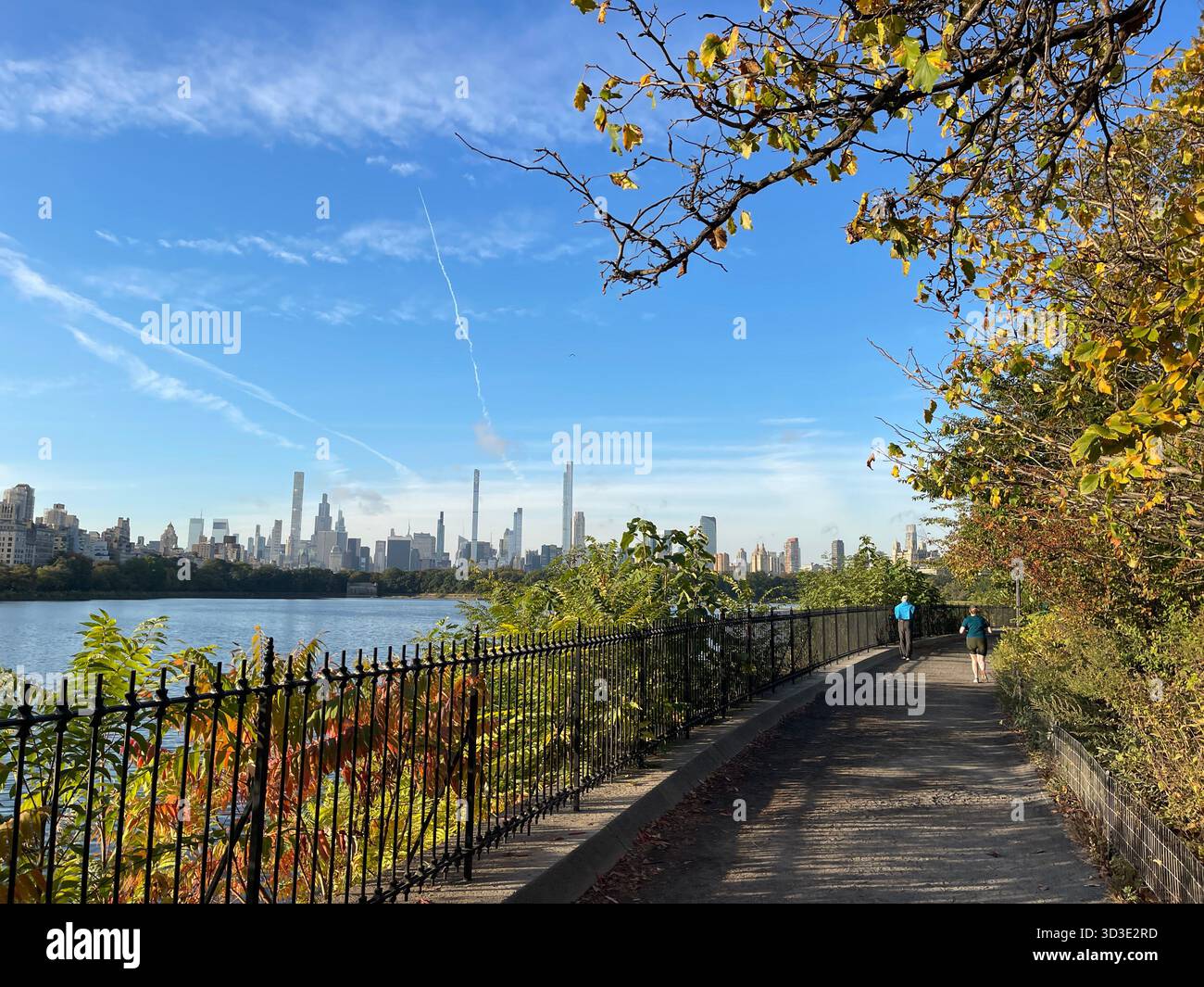 The Reservoir path winds gently through Central Park, perfect for walking or jogging.' - Smartphone Captured Stock Image