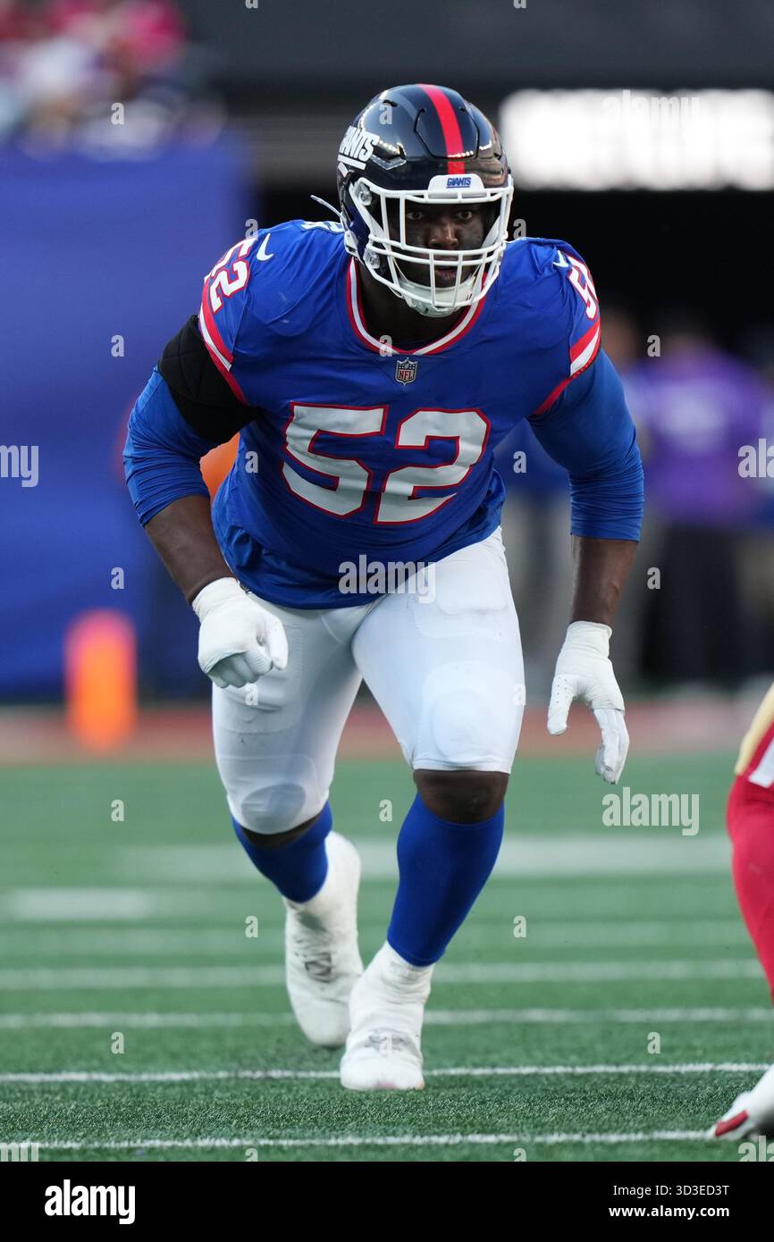 Model Victor Rushes New York Giants linebacker Victor Dimukeje (52) rushes the passer ...