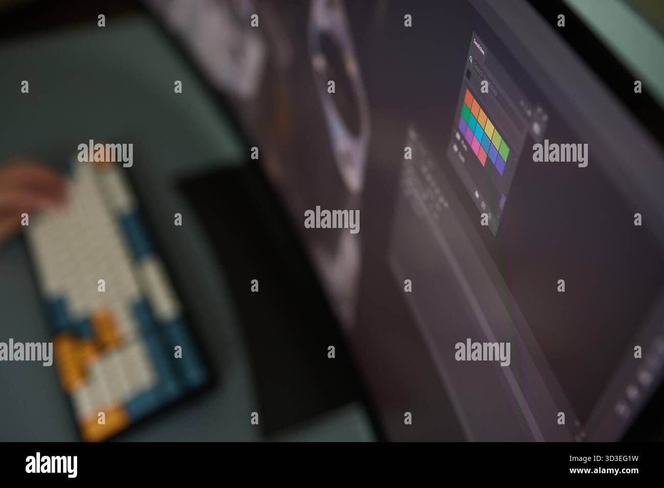 Designer Editing Photo On Computer In Office Stock Photo