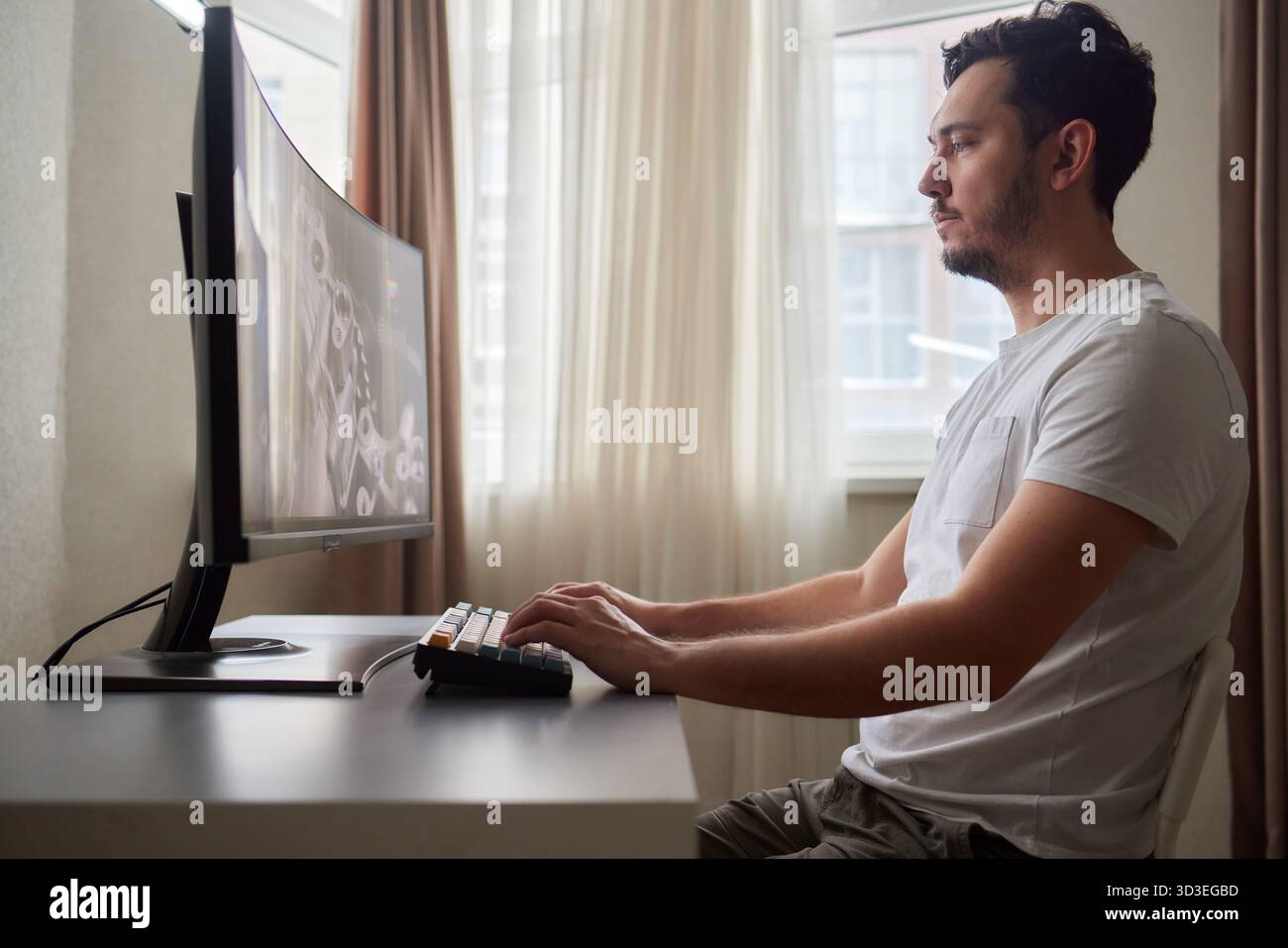 Designer Editing Photo On Computer In Office Stock Photo